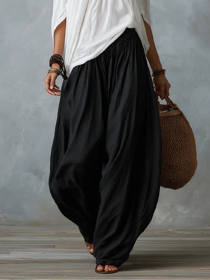 Conjunto Blanco de Top con Hombros Descubiertos y Pantalón Holgado